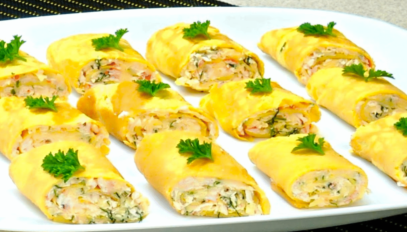 Ніжні рулетики з яєчних млинців з крабовою начинкою: ідеальна закуска для свят